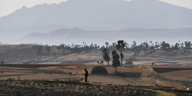 Ethiopia ethnic attack leaves over 200 killed, witnesses say 2 A man is silhoutted in a patchwork of harvested teff grain fields near the crash site of an Ethiopian airways operated by a Boeing 737 MAX aircraft on March 16, 2019, at Hama Quntushele village near Bishoftu in Oromia region.