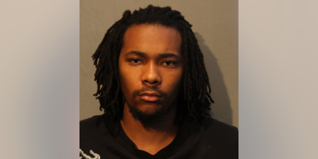 Joshua Hudson, 21 påstås ha slagit en manlig polis med en stulen bil och fortsatte att köra polisen lossades, enligt Chicago Police Department.