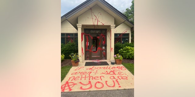 "If abortions aren't safe, neither are you!" reads graffiti in front of the vandalized Mountain Area Pregnancy Services building in Asheville, North Carolina.