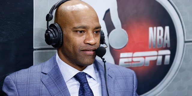 ESPN commentator Vince Carter looks on prior to a preseason game between the Miami Heat and the Boston Celtics at FTX Arena on October 15, 2021 in Miami, Florida.