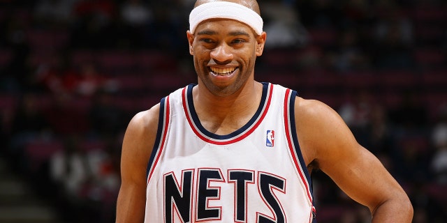 Vince Carter #15 of the New Jersey Nets smiles on the court during the game against the Philadelphia 76ers on Feb. 23, 2009 at the Izod Center in East Rutherford, New Jersey. The Nets won 98-96.