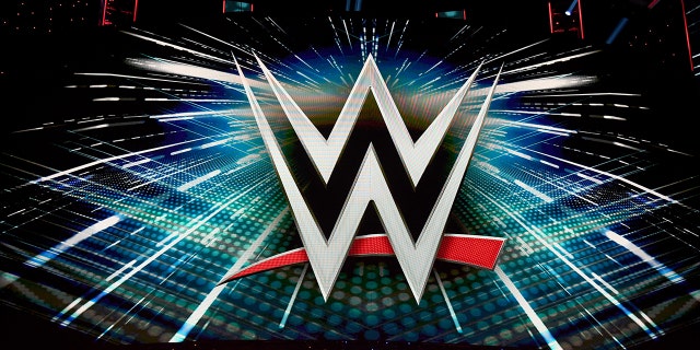 A WWE logo is shown on a screen before a WWE news conference at T-Mobile Arena on October 11, 2019 in Las Vegas, Nevada.