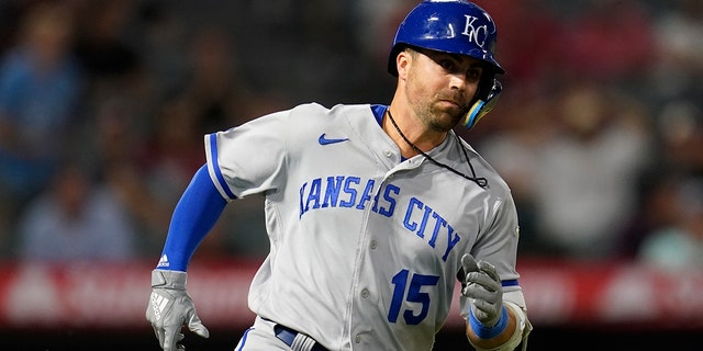 Kansas City Royals' Whit Merrifield doubles in the 11th inning of a game against the Los Angeles Angels in Anaheim, California on June 21, 2022.