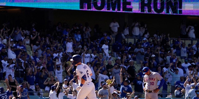 Dodgers' Will Smith rounds third after hitting a solo home run against the New York Mets, Sunday, June 5, 2022, in Los Angeles.