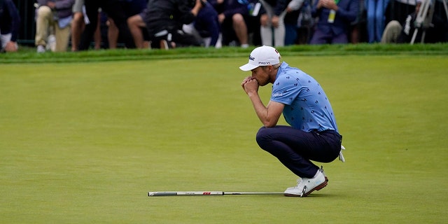 Will Zalatoris reacts after missing a putt on the 18th hole during the final round of the U.S. Open golf tournament at The Country Club, Sunday, June 19, 2022, in Brookline, Mass. 