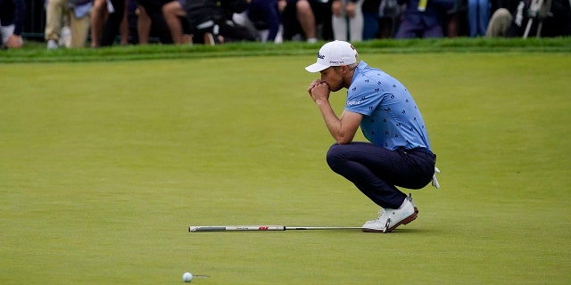 Will Zalatoris reacts after missing a putt on the 18th hole during the final round of the U.S. Open golf tournament at The Country Club, Sunday, June 19, 2022, in Brookline, Mass. 