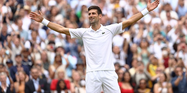 Novak Djokovic of Serbia celebrates winning his men's Singles Final match against Matteo Berrettini of Italy on Day Thirteen of The Championships - Wimbledon 2021 at All England Lawn Tennis and Croquet Club on July 11, 2021 in London, England.