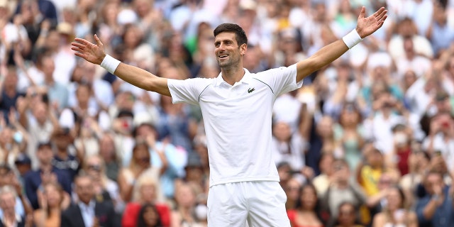 Novak Djokovic of Serbia celebrates winning his men's Singles Final match against Matteo Berrettini of Italy on Day Thirteen of The Championships - Wimbledon 2021 at All England Lawn Tennis and Croquet Club on July 11, 2021 in London, England.