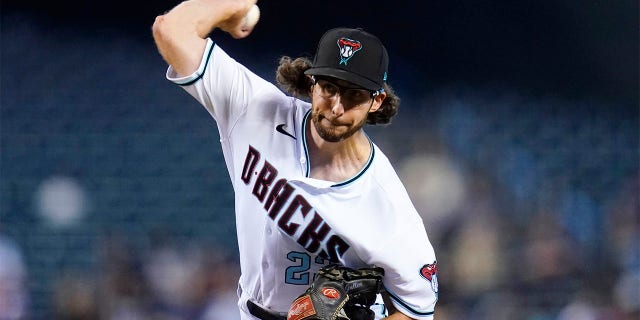 Arizona Diamondbacks starting pitcher Zac Gallen throws a pitch against the San Diego Padres during the first inning of a baseball game Tuesday, June 28, 2022, in Phoenix.