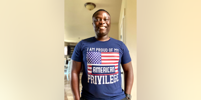 Alma Ohene-Opare wears a shirt that reads 'I am Proud of my American Privilege.'