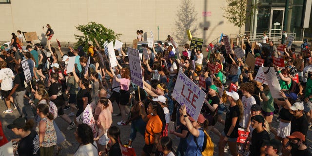 People march to protest the Supreme Court's decision in the Dobbs v Jackson Women's Health case on June 24, 2022 in Atlanta, Georgia. 