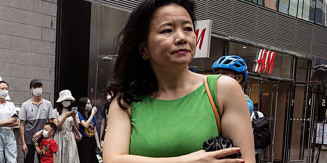 Cheng Lei, a Chinese-born Australian journalist for CGTN, the English-language channel of China Central Television, attends a public event in Beijing on Aug. 12, 2020. The Australian partner of the journalist who has been detained in China for nearly two years said Thursday, June 2, 2022, she is being denied the chance to speak with her family and consular staff, and her health is declining due to a poor prison diet.(G3 Box News Photo/Ng Han Guan, File)