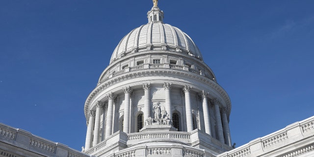 The Wisconsin State Capitol building stands as Wisconsin electors gather to cast their votes for the U.S. presidential election in Madison, Wisconsin, U.S., December 14, 2020. 