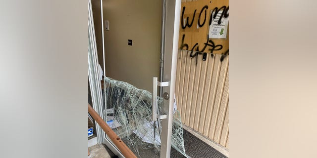 The suspect damaged the glass doors and wrote several messages, one of which read: "women hate." 