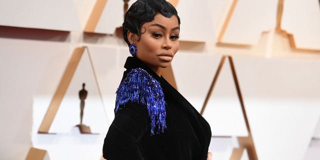 Blac Chyna arrives at the Oscars on Sunday, Feb. 9, 2020, at the Dolby Theatre in Los Angeles. Jury selection was set to begin Monday, June 21, 2022, in the trial over Chyna’s allegations that her former fiancé Rob Kardashian maliciously posted nude photos of her in 2017 after their tumultuous breakup. 