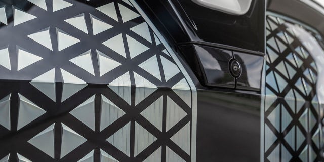 The iX grille is coated in a polyurethane that can heal scratches with applied heat.