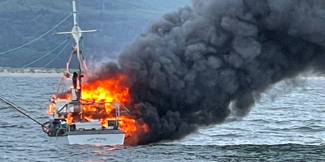 When crews arrived, a Good Samaritan had rescued the lone fisherman aboard the burning vessel, officials said.