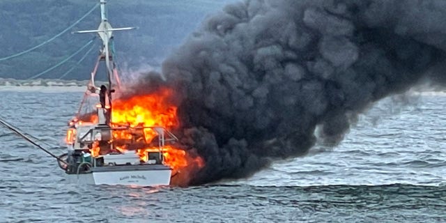 When crews arrived, a Good Samaritan had rescued the lone fisherman aboard the burning vessel, officials said.