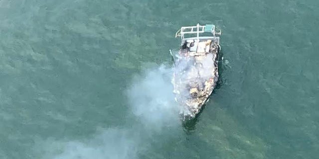 The vessel caught fire off the coast of Oregon's Manzanita Beach and eventually burned down to the waterline.