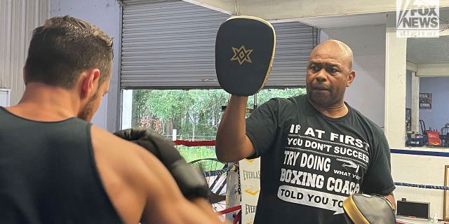 Roy Jones Jr. trains an aspiring fighter at his gym in Pensacola, Florida.