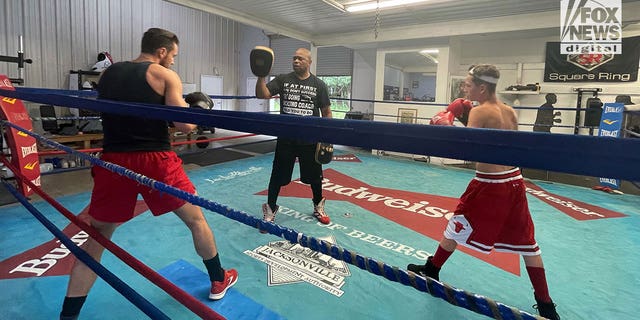 Roy Jones Jr. trains aspiring boxers at his gym in Pensacola, Florida.