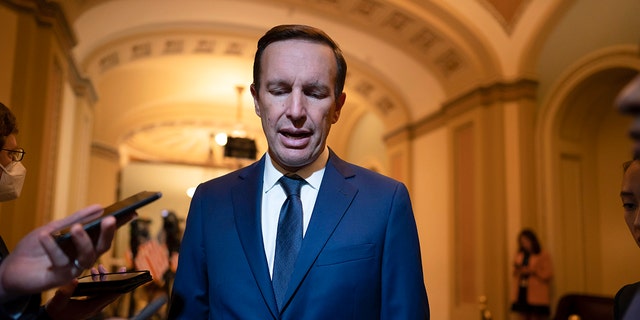 Sen.  Chris Murphy talks to reporters at the Capitol, Wednesday, June 22, 2022.