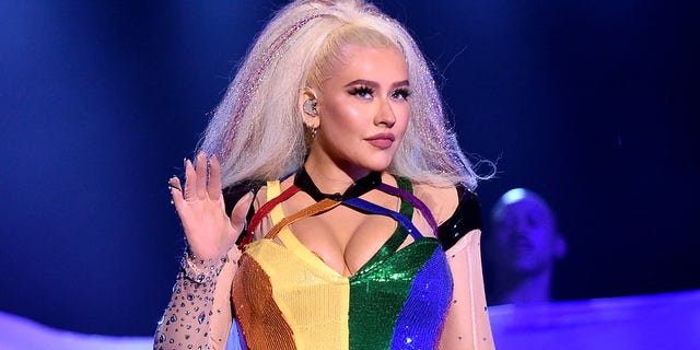 Christina Aguilera wore the colors of the pride flag for her headlining performance at LA Pride Saturday night.