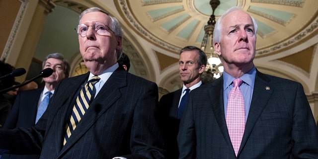File-Senator Mitch McConnell (left) and Senator John Cornyn (right) speak with reporters after a private policy meeting at the Washington Capitol on Tuesday, March 8, 2016. In the aftermath of recent horrific mass shootings in Uvalde, Texas and Buffalo, New York, a group of bipartisan senators, including Conin and Republican Senator Chris Murphy, held a private virtual meeting during a break to fire guns. Safety law.
