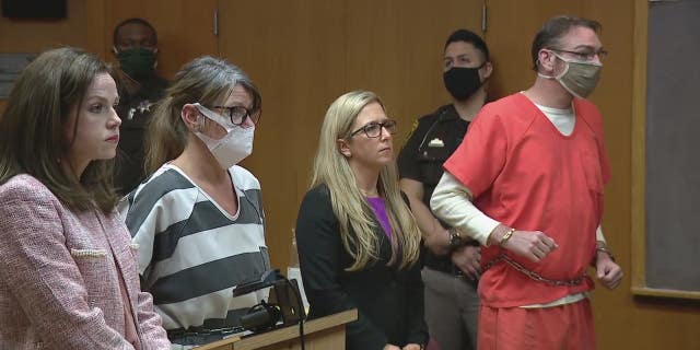 Jennifer and James Crumbley, the parents of suspect Oxford High School shooter Ethan Crumbley, appear in court on Monday.