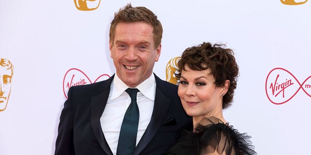 Damian Lewis Helen McRory pose for photographers on arrival at the BAFTA Television Awards in London, May 12, 2019.