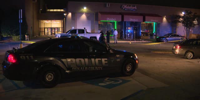 A Georgia shooting leaves one man dead and 3 wounded in Georgia Friday night after an argument over a woman.