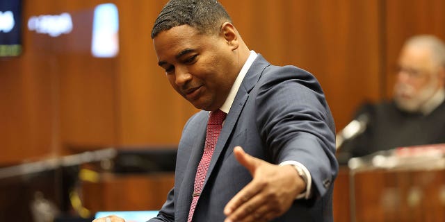 Deputy D.A. John McKinney offers opening statements during the trial of Eric Holder on Wednesday, June 15, 2022, in Los Angeles.