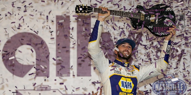 Chase Elliott won a Gibson Guitar trophy for his victory at Nashville Superspeedway.