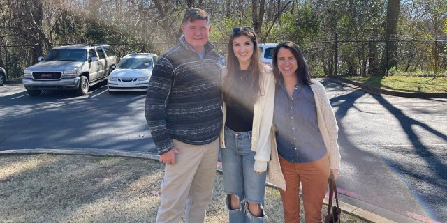 Emma Heussner with her parents
