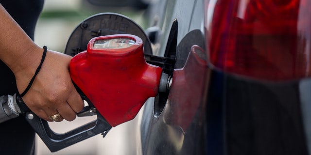  Brie Olootu pumps gas at an Exxon Mobil gas station on June 09, 2022 in Houston, Texas. Gas prices are breaching record highs as demand increases and supply fails to keep up. 