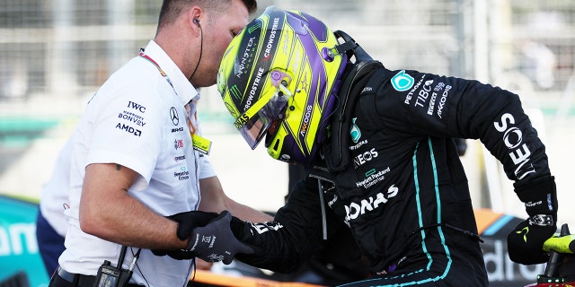 Hamilton needed help getting out of his car in Baku.