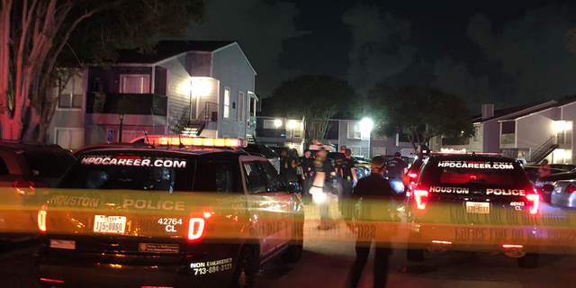 Photo of police officers responding to a shooting at an apartment complex in Harris County, Texas, on May 30. (Houston Police Department)