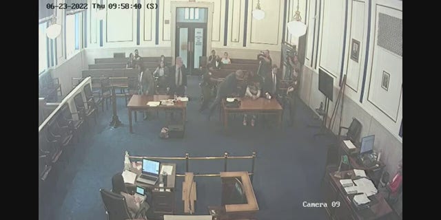 An Ohio man was seen attacking a suspect in a courtroom. The suspect is accused of killing the man's son.