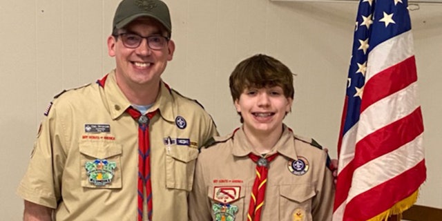 Boy Scout Eli Skrypczak (at right) of Wisconsin, who is 15, along with his father, Dan Skrypczak, who is a Boy Scout troop leader.