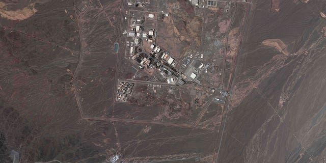 This satellite image from Planet Labs PBC shows Iran's underground Natanz nuclear site, as well as ongoing construction to expand the facility in a nearby mountain to the south, near Natanz, Iran, May 9, 2022.