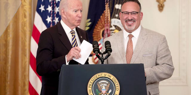 President Joe Biden and Education Secretary Miguel Cardona deliver remarks during an event for the 2022 National and State Teachers of the Year in the East Room of the White House on April 27, 2022 in Washington, D.C.