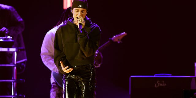 Justin Bieber performing at the Grammy Awards