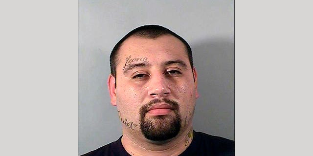 This photo provided by the California Department of Corrections and Rehabilitation shows Justin William Flores who is the alleged gunman in a Southern California shootout that killed two police officers on Tuesday, June 14, 2022 in El Monte, Calif. Flores was identified as the suspect by the Los Angeles County District Attorney's Office on Wednesday, June 15, 2022.