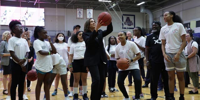 Vice President Kamala Harris plays basketball with schoolgirls during a Title IX 50th Anniversary Field Day event at American University on June 22, 2022 in Washington, DC. Harris missed five shots in a row, before making her sixth.