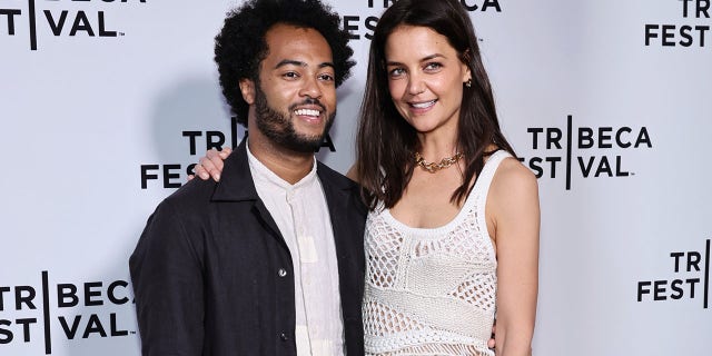 Bobby Wooten III and Katie Holmes attend "Alone Together" premiere during the 2022 Tribeca Film Festival.
