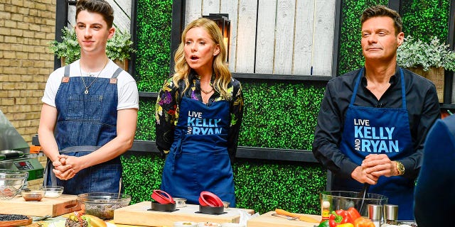 NEW YORK, NY - JUNE 02:  Kelly Ripa and Ryan Seacrest are seen outside "Live with Kelly and Ryan" on June 2, 2022 in New York City.  (Photo by Raymond Hall/GC Images)