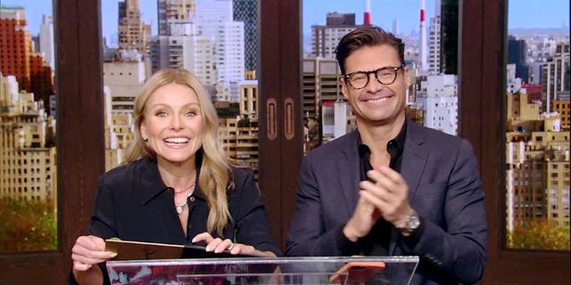 In this screenshot posted June 25, Kelly Ripa and Ryan Seacrest speak at the 48th Annual Daytime Emmy Awards, which aired June 25, 2021. (Photo by 2021 Daytime Emmy Awards via Getty Images)