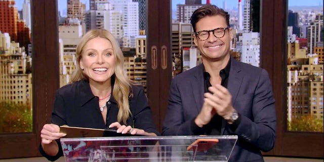 In this screenshot released on June 25, Kelly Ripa and Ryan Seacrest speak during the 48th Annual Daytime Emmy Awards broadcast on June 25, 2021. (Photo by Daytime Emmy Awards 2021 via Getty Images)