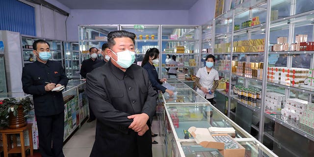 In this photo provided by the North Korean government, North Korean leader Kim Jong Un, center, visits a pharmacy in Pyongyang, North Korea on May 15, 2022. Independent journalists were not given access to cover the event depicted in this image distributed by the North Korean government. The content of this image is as provided and cannot be independently verified. Korean language watermark on image as provided by source reads: "KCNA" which is the abbreviation for Korean Central News Agency. (Korean Central News Agency/Korea News Service via AP, File)