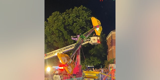 The rescue occurred Friday night in Kirkwood, Missouri, when a carnival ride apparently broke down and stranded seven people on the attraction.